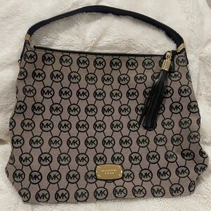 Michael Kors signature canvas large shoulder bag.